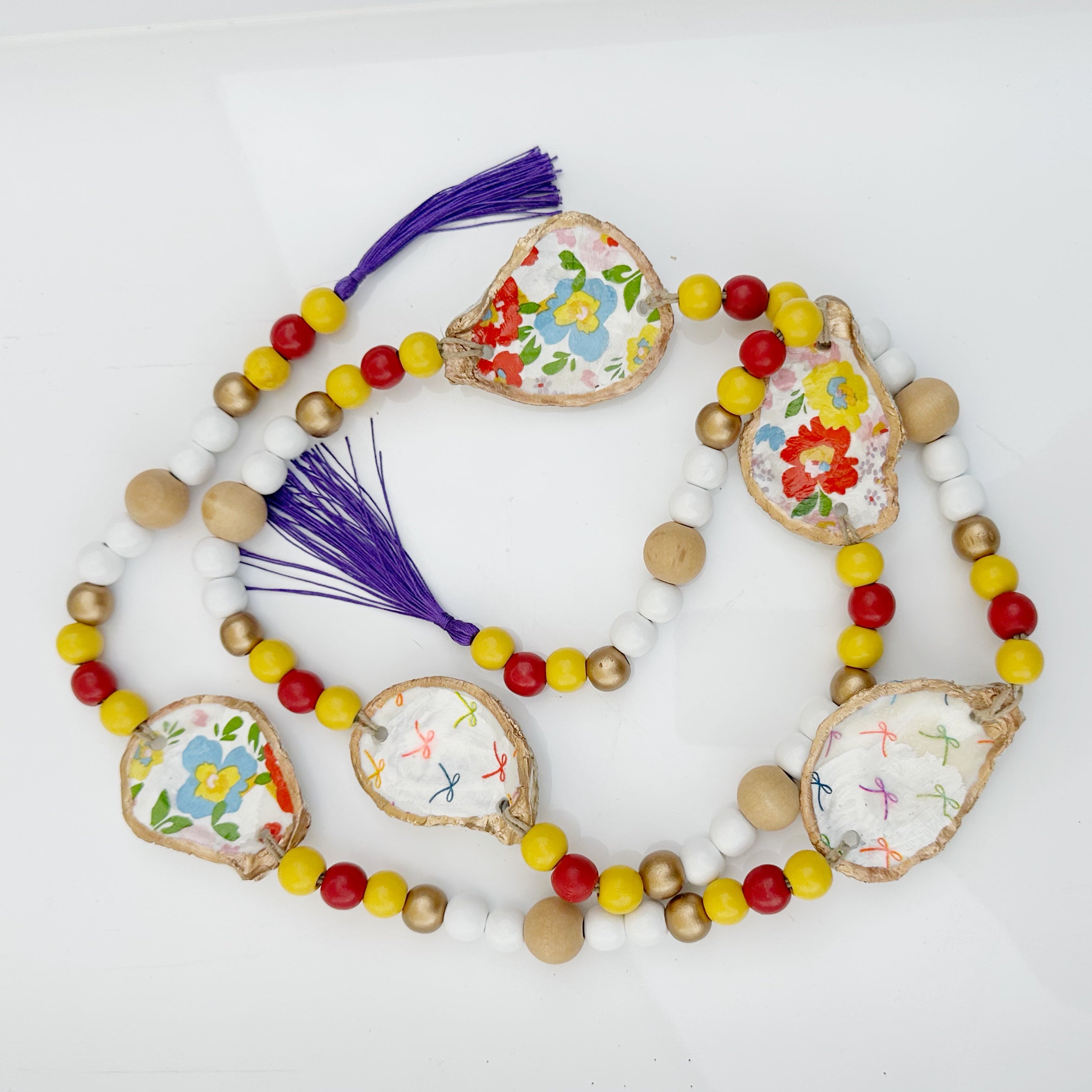 Oyster Garland - bright floral/bows