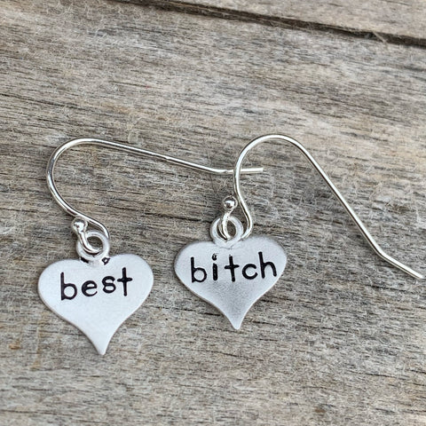 Pair of sterling silver earrings - heart shape- “best bitch”